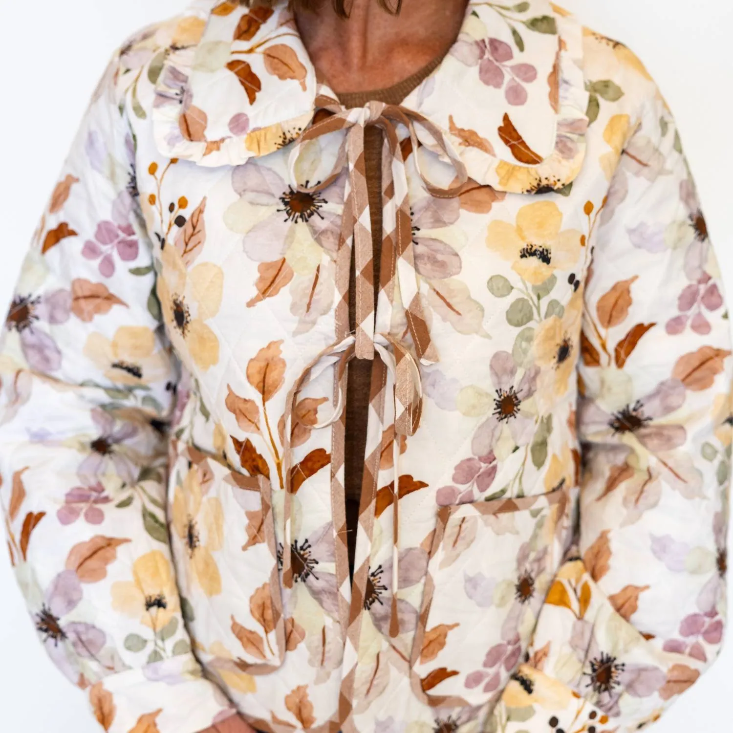 The Lorelai Floral Quilted Jacket In Ivory